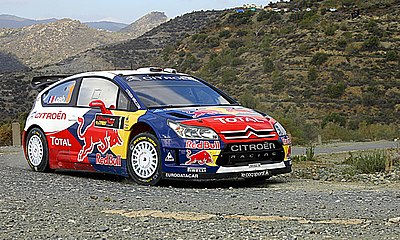 Which car manufacturer did Sébastien Loeb represent during his nine consecutive WRC titles?
