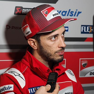 How many different decades has Dovizioso won a MotoGP race in?