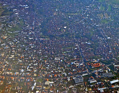What is the metropolitan area centered on Denpasar called?