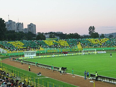 In which month and year did the club announce its association with Sporting Juniorul Vaslui?