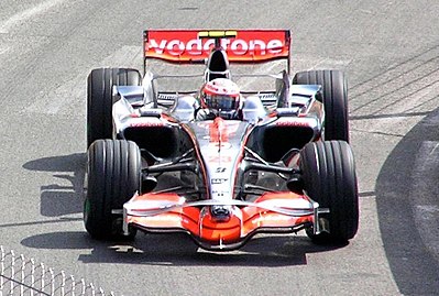 Heikki Kovalainen won which racing championship in 2004?