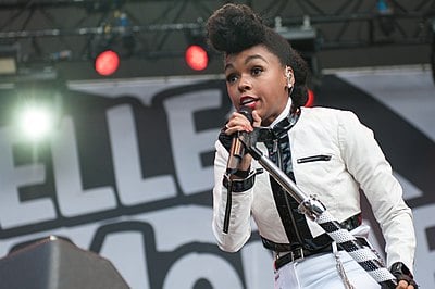 In which year did Janelle Monáe release her first full-length studio album, The ArchAndroid?