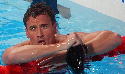 Who is Lochte’s most decorated fellow swimmer?