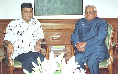 What other language apart from Assamese did Bhupen Hazarika mainly write and sing in?