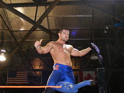 Who was Davey Richards' tag team partner when he won the PWG World Tag Team Championship twice?