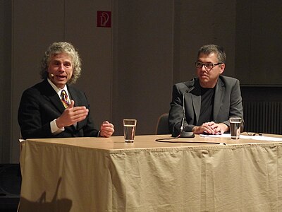 Pinker argues that language is shaped by what?