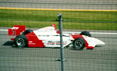 Which racing series does Hélio Castroneves compete in full-time?
