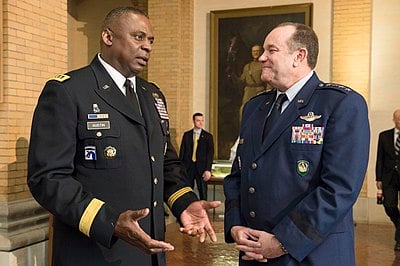 Who did Austin replace as the commander of US Forces-Iraq?