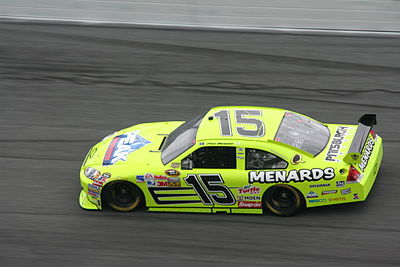 Which series did Paul Menard compete in part-time in 2021?