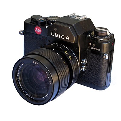 What organizations has Leica Camera been a part of?[br](Select 2 answers)