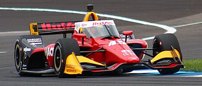 Who was the first Danish driver to win an IndyCar race?