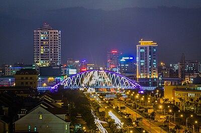 What is the main airport serving Ho Chi Minh City?