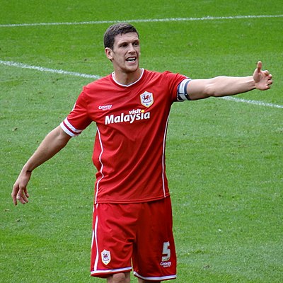 At what club did Mark Hudson start his career?