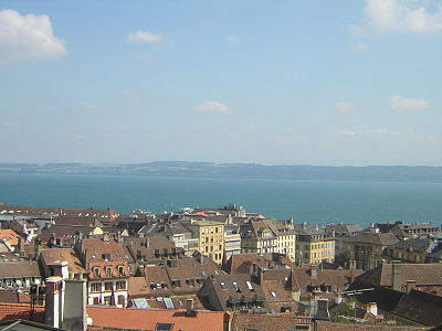 Which apparel company has its headquarters in Neuchâtel?