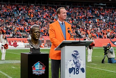 In which year was Peyton Manning inducted into the Pro Football Hall of Fame?