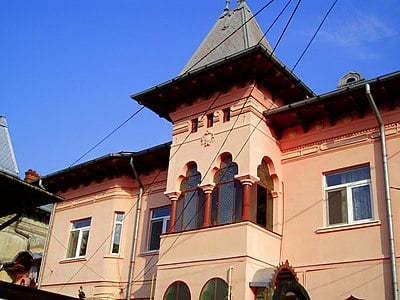 What was one of his design works related to justice in Ploiești?