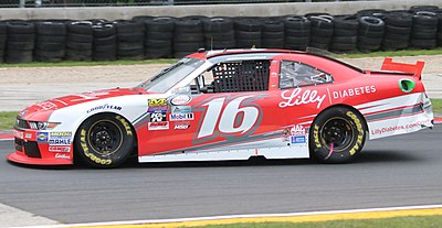 In which year did Carl Edwards win an owner's championship with Roush Fenway Racing in the Xfinity Series?