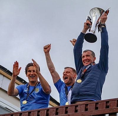 In which season did Stockport County win the Fourth Division championship?
