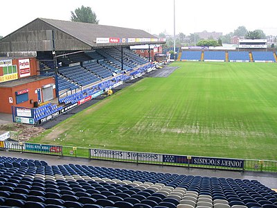 Which stadium has been Stockport County's home ground since 1902?