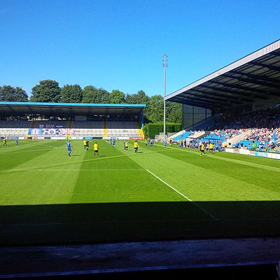 What is the capacity of Harrogate Town A.F.C.'s home ground, Wetherby Road?