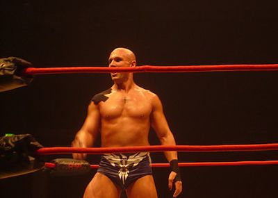 What is the real name of Christopher Daniels?