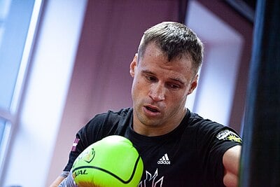 Who did Briedis fight in his first professional bout?