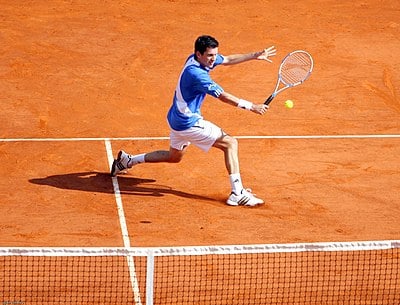 What style of tennis did Tim Henman play?