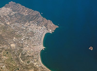 Which city's residents frequently visit Benidorm?