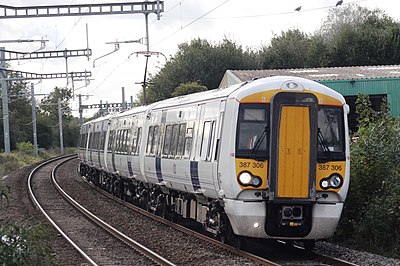 How many train operating companies were combined into the Greater Western franchise in April 2006?