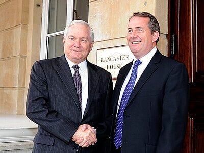 What year did Liam Fox have to repay expenses due to the scandal?