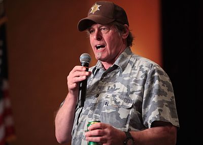 What type of guitar is Ted Nugent known for using?