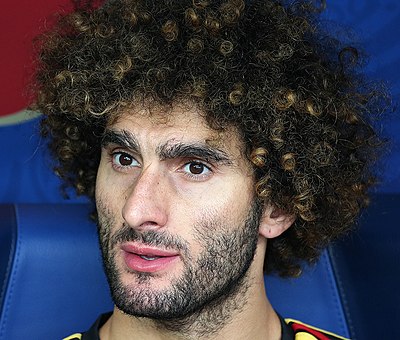 Where does Marouane Fellaini currently play professional football?