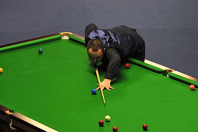 What is the shape of a snooker table?