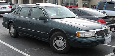 Which Lincoln vehicle series adopted the Lincoln name in 1986?