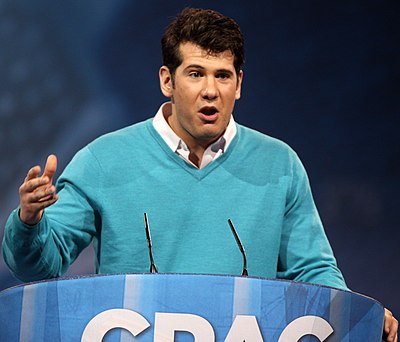 Which policy did Steven Crowder's YouTube channel violate in October 2022, leading to a two-week suspension?