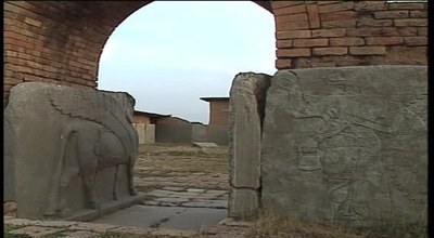 How far is Nimrud from the modern-day Assyrian village of Noomanea?