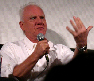 In which year did Malcolm McDowell receive a star on the Hollywood Walk of Fame?