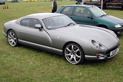 What material is commonly used for TVR car bodies?