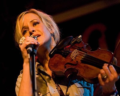 How long did Martie tour with her bluegrass quartet in high school?