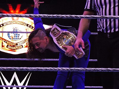 Who was Nakamura's tag team partner when he won the WWE SmackDown Tag Team Championship?