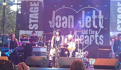 What instrument does Joan Jett play?