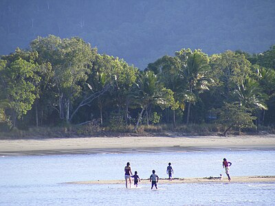 What type of climate does Cairns have?