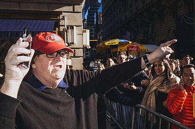 In which of the following institutions did Michael Moore study?[br](Select 2 answers)