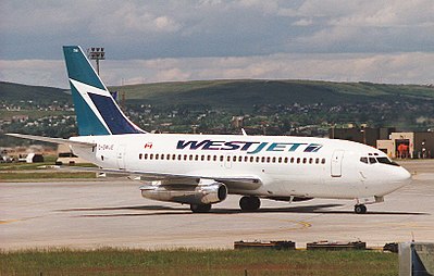 How many passengers did WestJet carry in 2018?