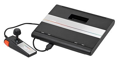 Who acquired the home console and computer divisions of Atari,  in 1984?
