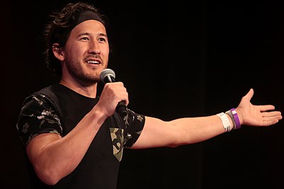 What type of content does Markiplier mainly upload?