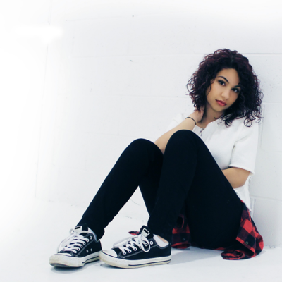 In what year did Alessia Cara begin posting covers on YouTube?