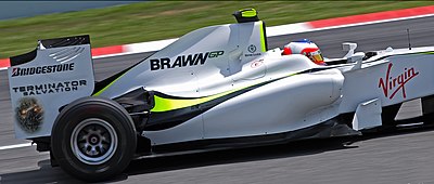 In which race did Brawn GP achieve their first pole position and 2nd place in qualifying?
