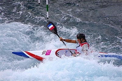 Which French canoeist won his third gold medal in men's slalom canoeing singles at the 2012 Summer Olympics?