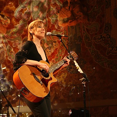 What is the first name of Suzanne Vega's alter ego used in her songs?